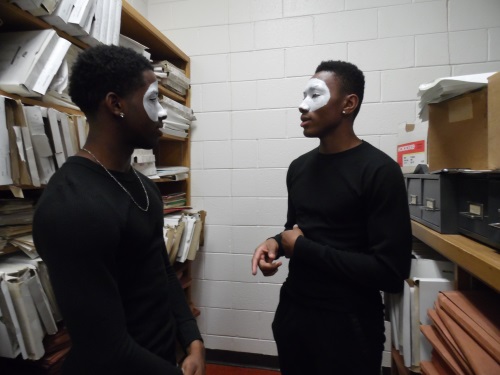 Genisis mimes back stage